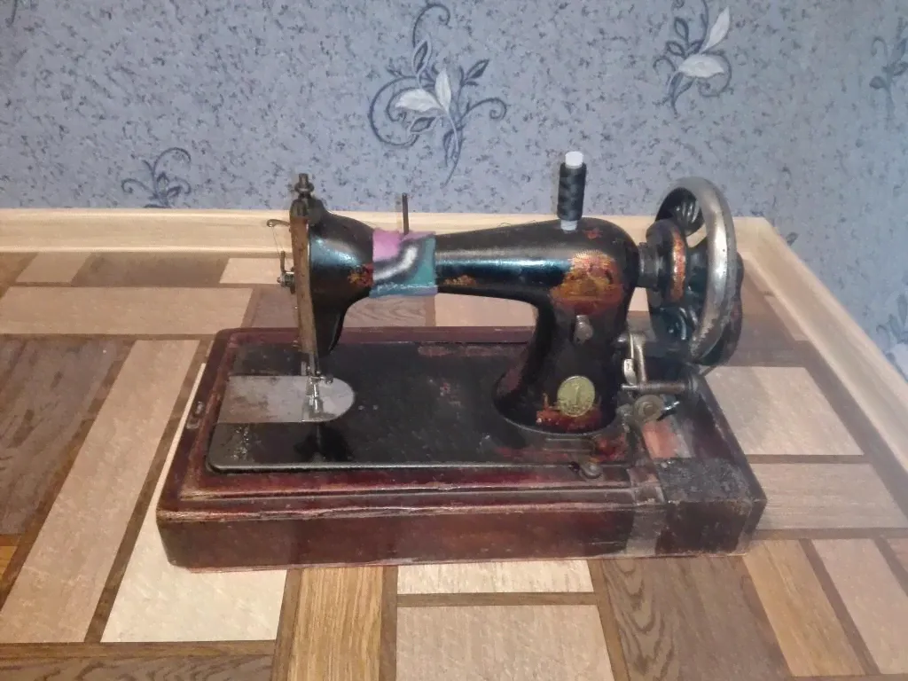 The singer manfg.co trade mark № J1405859 ( 1905 года выпуска, страна Шотландия)