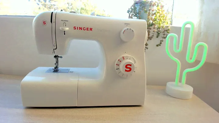 Guía de Uso y Manejo SINGER Tradition 2250