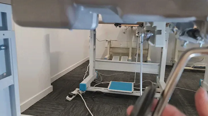 How to adjust your knee lever on an industrial sewing machine.