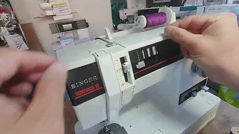 Singer Serenade 10 & 20 : Comment enfiler le fil supérieur ?